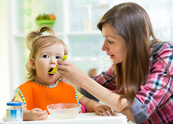 Mom Feeds Toddler